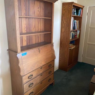 https://ctbids.com/estate-sale/34519/item/3865864/Pair-Of-Large-Wooden-Bookshelves