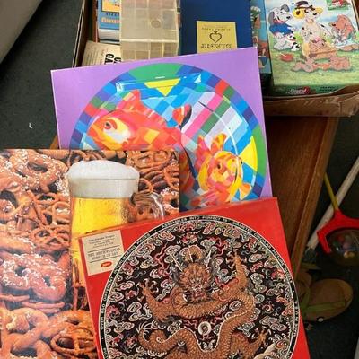 https://ctbids.com/estate-sale/34519/item/3877338/Vintage-Puzzles-And-Playing-Cards