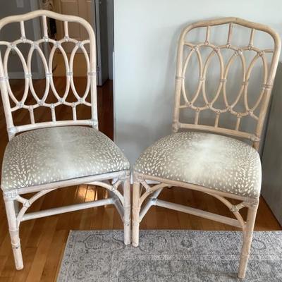 $125 each-2 rattan and printed seat chairs 39"H 20"L 21"depth