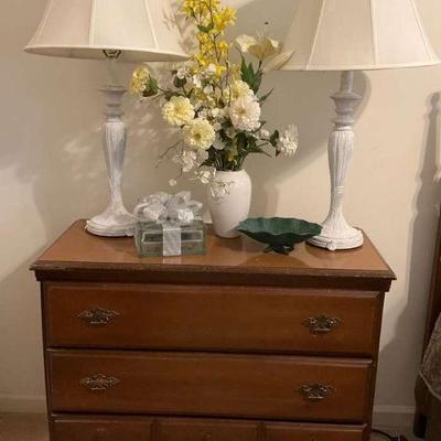 Vintage wooden dresser with decorative accents
