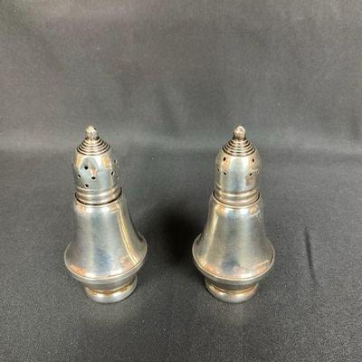 Pair of may flower sterling weighted salt and pepper shakers