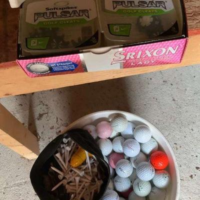Huge bucket of golf balls tees and more