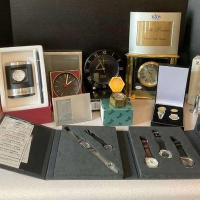 Assorted clocks watches, and accessories