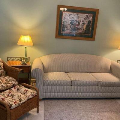 Living room furniture set with wicker lounge chair