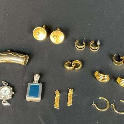 Elegant gold tone and silver jewelry assortment