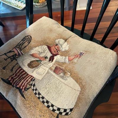 Each chair has one of these cushions. 