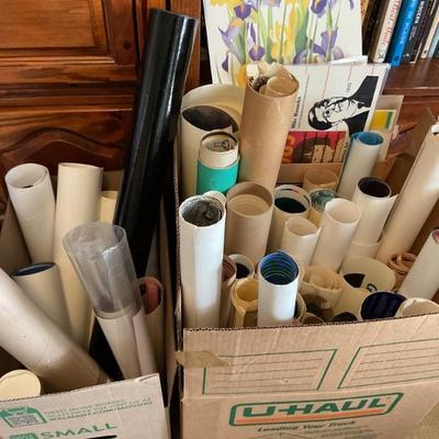 Rolled up maps and wall art