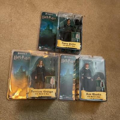 Harry Potter action figures still in boxes