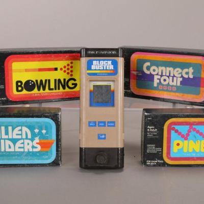 Block Buster hand held video game with interchangeable cartridges