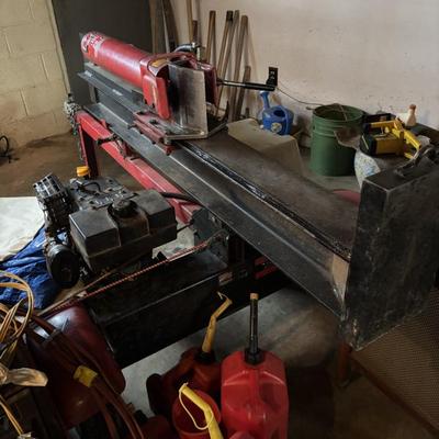 Log splitter + gas cans