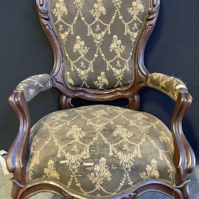 Antique Upholstered Parlor Chair On Casters
