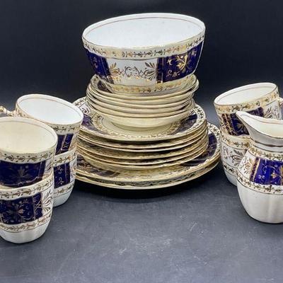 Set 22 Hand Painted Gilt Porcelain Dinnerware
