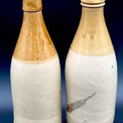 (2) Stamped Vintage Stoneware Bottles
One says "H. Kennedy Pottery Glasgow" 
The other says "Crosveror Glasgow"