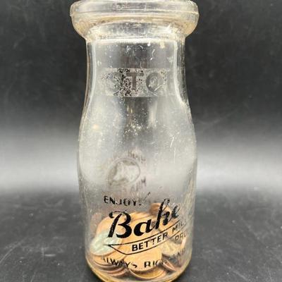 Vintage Baker’s Better Milk Products Glass Bottle with Old Pennies
