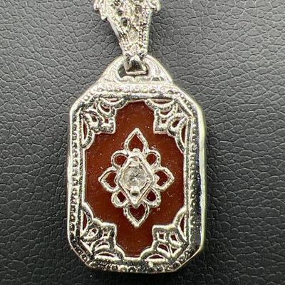 Sterling Silver Necklace with Sparkling Pendant
