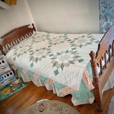 Antique twin bed with spindle detail