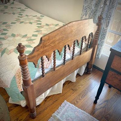 Antique twin bed with spindle detail