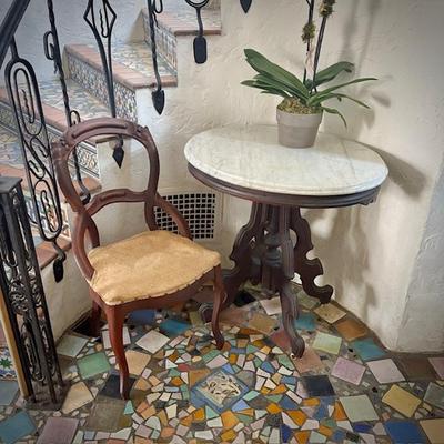 Antique marble-top side table and antique chair