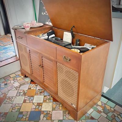 Mid-century Fisher "The Fisher Anniversary Series" console stereo with turntable. Note that Koss components have been added.