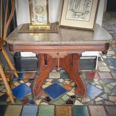 Antique Eastlake marble-top dining table