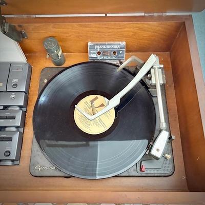 Mid-century Fisher "The Fisher Anniversary Series" console stereo with turntable. Note that Koss components have been added.