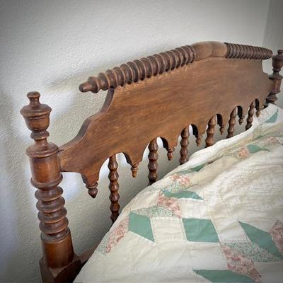 Antique twin bed with spindle detail