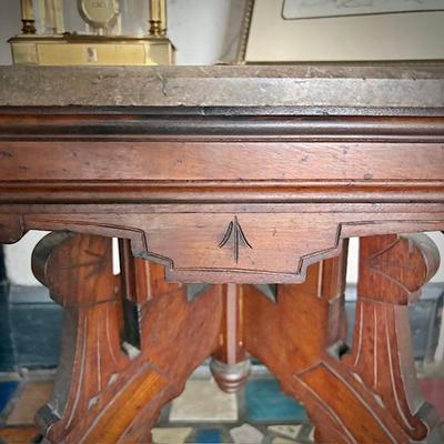 Antique Eastlake marble-top dining table