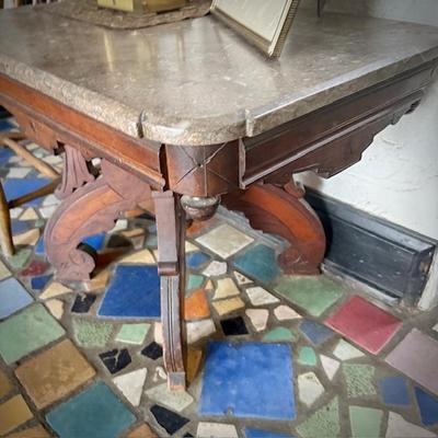 Antique Eastlake marble-top dining table