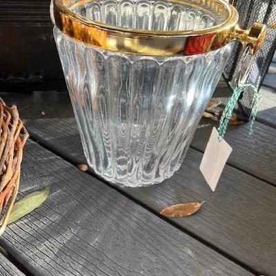Glass ice bucket with brass trim