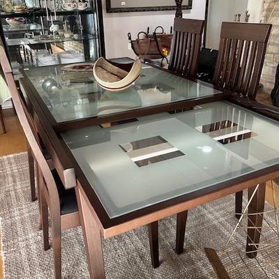 Glass table with attached leaves