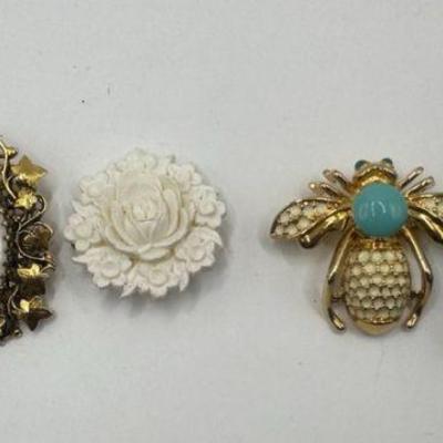 Vintage Brooches And Tiny Lockets
