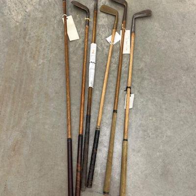 65 wood head driver and five more wood shaft golf clubs