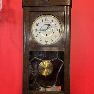 Vintage German Black Forest Imports box clock, key wind with key, runs and chimes, hands need adjustment, 13” x 31”