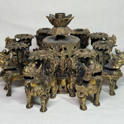 RARE Tibetan Nepalese bronze candleholder, 8 removable foo lion holders encompassing a central candleholder, 11” diameter
