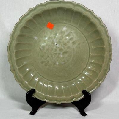 Chinese 15th c Ming Dynasty Lonquan Hongwu-Yongle period Celedon charger, foliate shape with heavily potted fluted sides and everted...