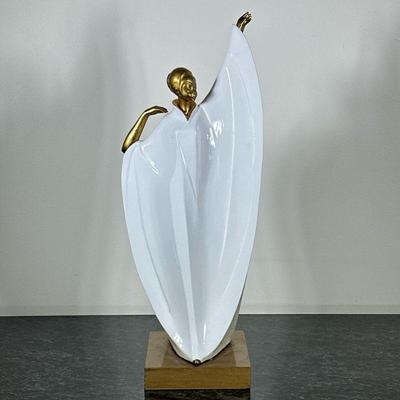ART DECO CERAMIC FIGURINE | Art deco figurine of woman in robe. - h. 19 x w. 8 x d. 5.5 in

