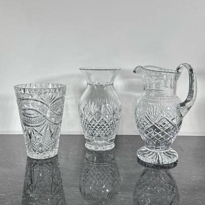 (3pc) Crystal Vases and Pitcher | Including; two carved and etched vases, and water/juice pitcher. - h. 11 x w. 7 in (pitcher)

