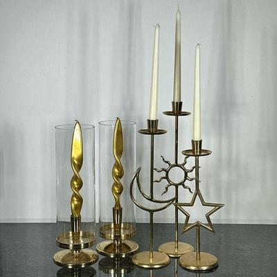 (5pc) BRASS CANDLESTICKS | Pair of brass candlesticks with glass and set of 3 tall brass candlesticks with Moon, Sun, and Star . - h. 16...