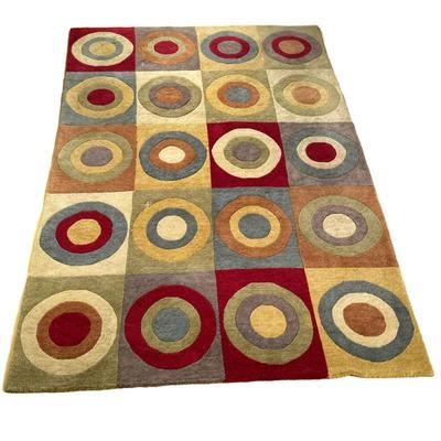 COLORFUL RUG | Colorful circular patterned rug. - w. 68 x l. 108 in
