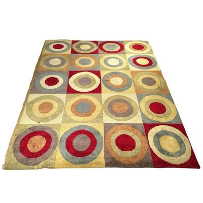 COLORFUL PATTERNED RUG | Colorful circular patterned area rug. - w. 102 x l. 133 in