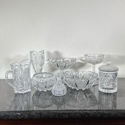 (8pc) Cut Glass Pieces | Including; two compotes, two bowls, water pitcher, vase, small syrup pitcher with stopper, and lidded jar. - h....