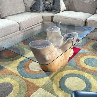 WOOD & GLASS COFFEE TABLE | Tree trunk base coffee table with glass top having three pointed tree trunk as base. - h. 18.5 x w. 31.5...