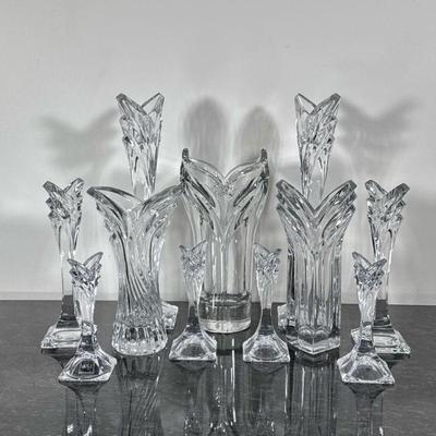 (11pc) Mikasa Crystal | Matching candle stick holders in small, medium and large. Two matching vases. A large vase with Label from W....