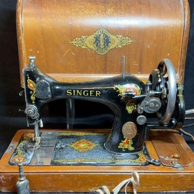 Antique hand crank singer sewing machine