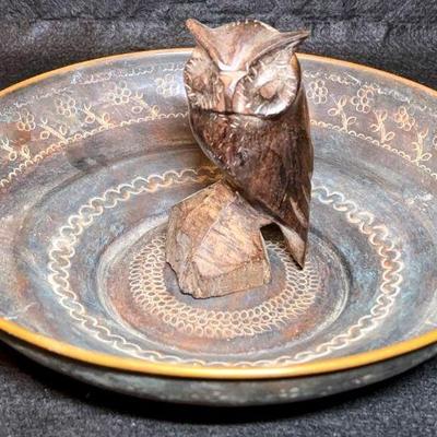 Carved iron wood owl in a stamped metal bowl