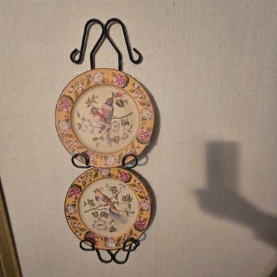 Vintage Bird-Themed Decorative Plates
•	A set of two vintage hand-painted decorative plates, featuring delightful bird and floral...