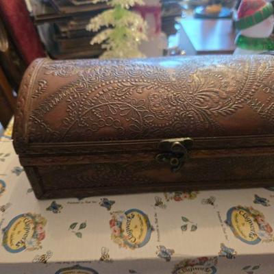 Jewelry Box with Embossed Design
- This beautifully embossed leather jewelry box is as functional as it is decorative. Offering a vintage...