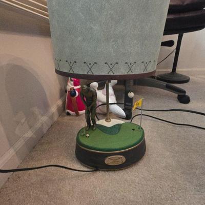 Golf-Themed Lamp with Golfer Figurine Base
- Description: A unique golf-themed lamp featuring a golfer mid-swing, capturing the essence...