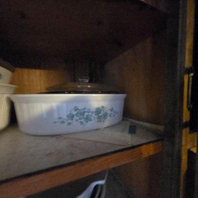 Pyrex Vintage Casserole Dish Collection
•	A collection of vintage Pyrex casserole dishes in classic white with floral accents. These...