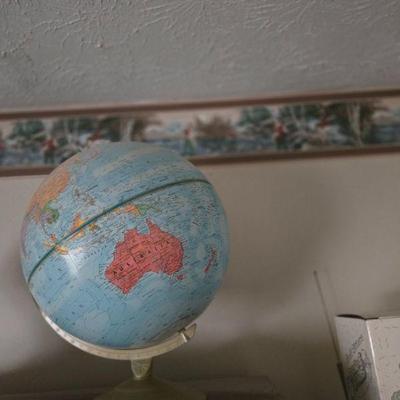 Vintage Globe
- This vintage globe, set on a brass stand, is a beautiful and functional piece for any office, study, or living space....